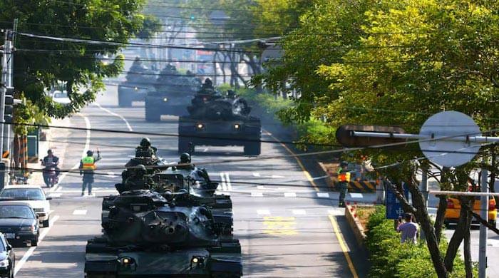 China slaps sanctions on US firms over Taiwan arms sales
