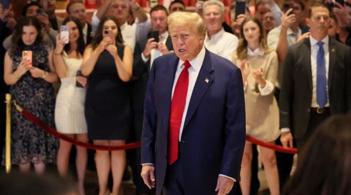 Trump must be sentenced in hush money case, judge signals no jail