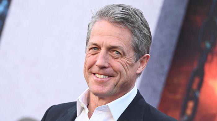 Hugh Grant jokes he bans his wife from watching hia ONE '90s flop movie