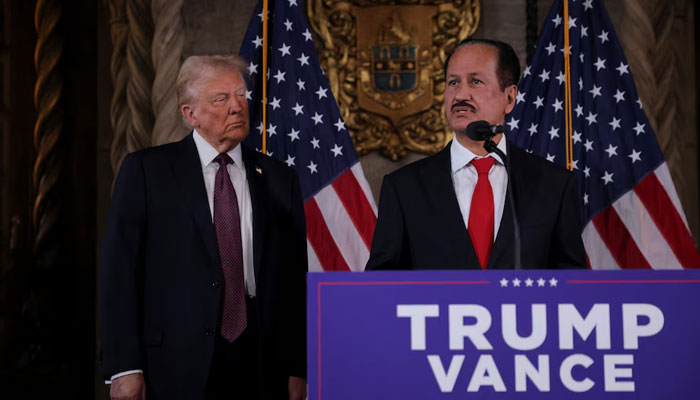 President-elect Donald Trump listens as Hussain Sajwani, CEO of DAMAC Properties, speaks during a news conference at Mar-a-Lago, Tuesday, Jan. 7, 2024, in Palm Beach, Fla. — Reuters
