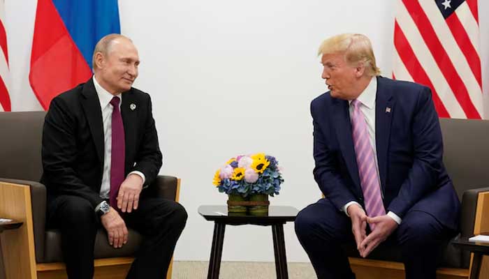 Russias President Vladimir Putin and US President-elect Donald Trump talk during a bilateral meeting at the G20 leaders summit in Osaka, Japan, June 28, 2019. — Reuters