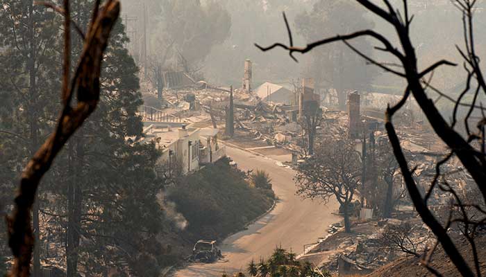 Los Angeles firefighters make progress as intense winds ease for now