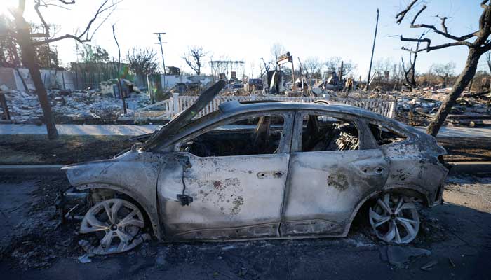 Remains of a Tesla electric car, destroyed by the Palisades Fire are seen, at the Pacific Palisades neighborhood in Los Angeles, California, US January 13, 2025. — Reuters