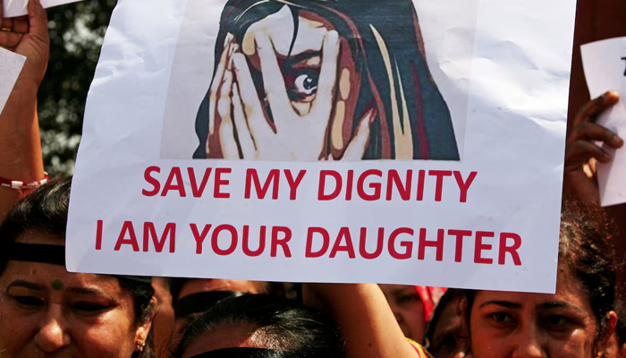 People participate in a protest against the rape of an eight-year-old girl in Kathua near Jammu, and a teenager in Unnao, Uttar Pradesh, in Amritsar, India. — Reuters/File