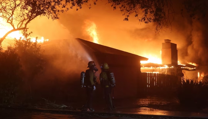 Firefighters work during the Eaton Fire in Pasadena, California, US, January 8, 2025. — Reuters