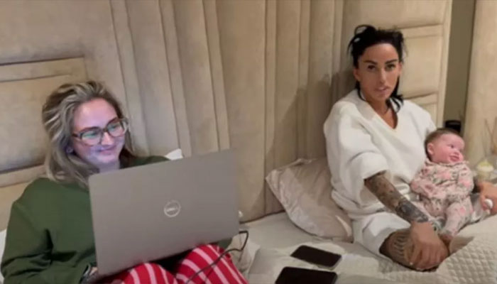 Sophie Price (left) stops by Katie Prices (right) home with her newborn daughter Olive