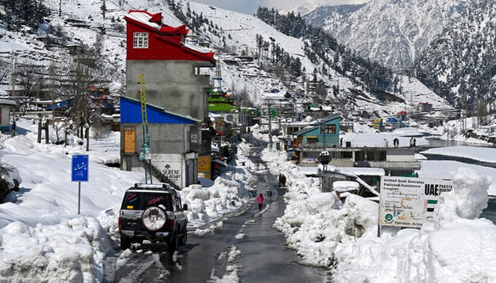 A view of snow laden Pishmal Bazar in Kalam on March 4, 2024. — AFP