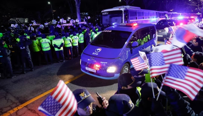 A motorcade believed to be carrying South Koreas impeached President Yoon Suk Yeo arrives at the Seoul Detention Center in Uiwang, South Korea, January 18, 2025. — Reuters