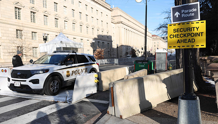 A US Secret Service member parks at a security checkpoint on the parade route ahead of the inauguration of US President-elect Donald Trump on January 20, 2025 in Washington, DC. — AFP
