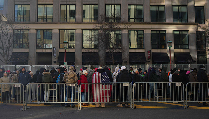 Supporters wait outside Capital One Arena ahead of the inauguration of US President-elect Donald Trump on January 20, 2025 in Washington, DC. Donald Trump takes office for his second term as the 47th president of the United States. — AFP