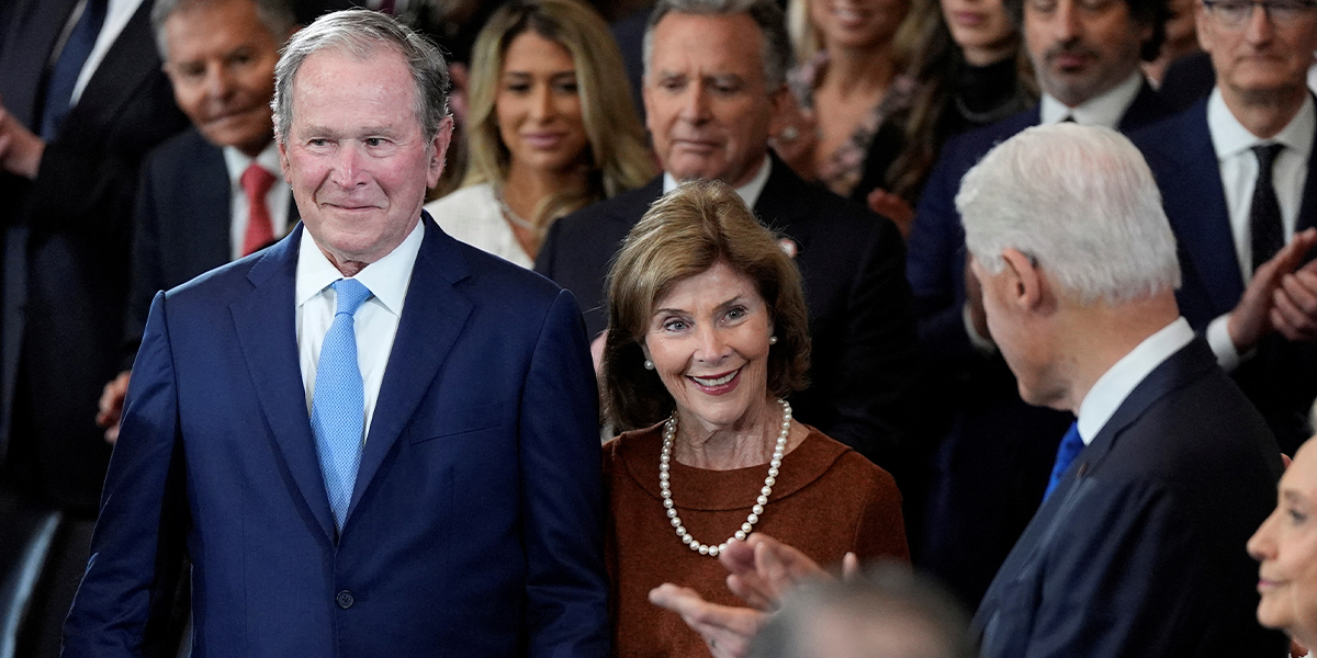 Former president of the US George W Bush (L) with his wife Laura Bush conversing with former president Bill Clinton during the inauguration ceremonies in the Rotunda of the US Capitol on January 20, 2025 in Washington, DC. — Reuters