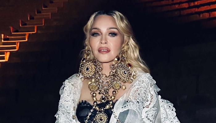 Photo: Madonnas new beau warned about her paranoia, insecurities: Source
