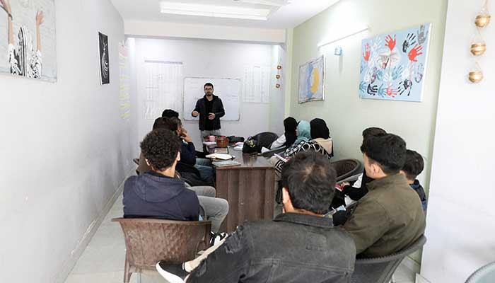 Afghan citizens, who are in the process for resettlement in the US attend English language class on the outskirts of Islamabad, January 22, 2025. — Reuters