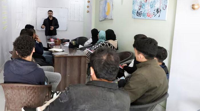 'Horrible... no hope anymore': Afghans decry Donald Trump's refugee halt