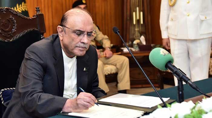 President Zardari assents to contentious Peca amendment bill amid uproar by opposition, journalists