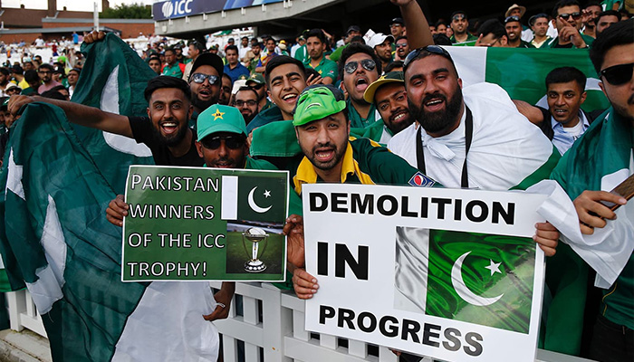 Pakistani fans holding posters during a match at ICC Mens Champions Trophy 2017. — AFP/File