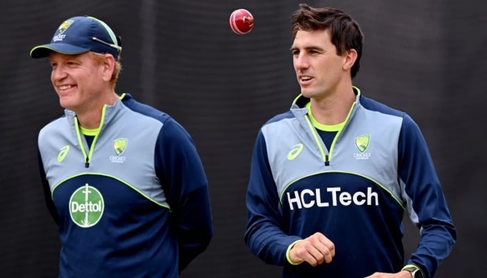 Australias coach Andrew McDonald and captain Pat Cummins at a practice session, Melbourne, December 24, 2024. — AFP