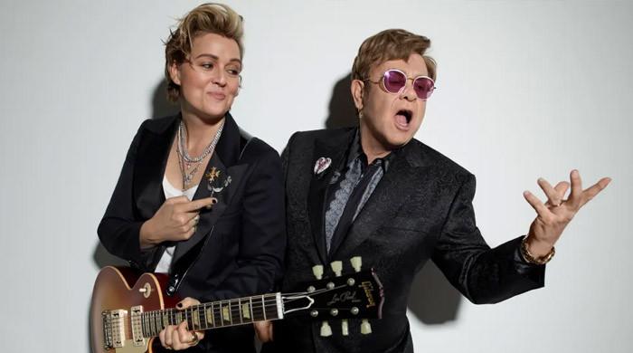 Brandi Carlile dishes on harsh comments from John Elton & how 'lyrics got torn up'