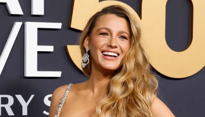 Expert weighs in on Blake Livelys body language at SNL 50 red carpet