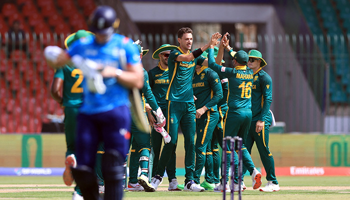 South Africas Marco Jansen celebrates with teammates after taking the wicket of Englands Jamie Smith, caught out by Aiden Markram during ICC Champions Trophy 2025 match at National Stadium, Karachi on March 1, 2025. — Reuters