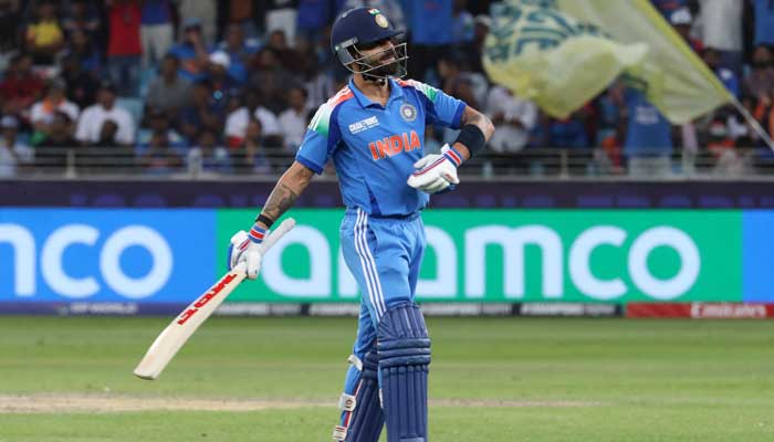 Indias Virat Kohli walks back to the pavilion after losing his wicket, caught out by Australias Ben Dwarshuis off the bowling of Adam Zampa at Dubai International Stadium, Dubai, United Arab Emirates - March 4, 2025. — Reuters