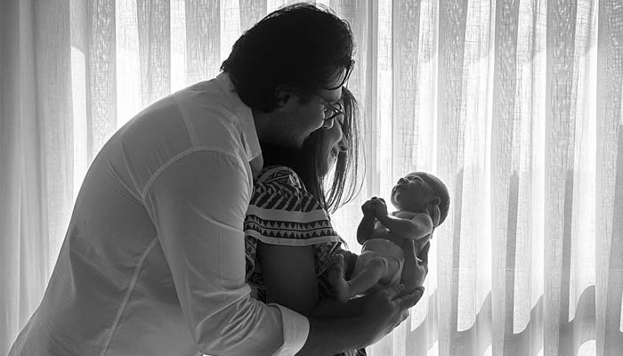 Pakistani actress Mariyam Nafees and her husband Amaan Ahmed holding their new born baby, March 17, 2025. — Instagram/@mariyam.nafees