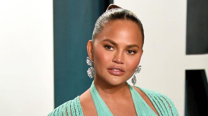 Chrissy Teigen’s closet chaos ends in a brutal injury