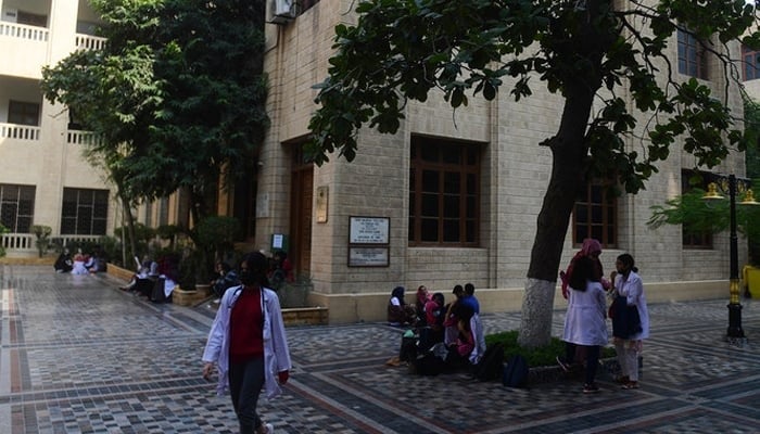 In this picture taken on January 13, 2022, students gather in the yard of a university in Karachi. — Reuters