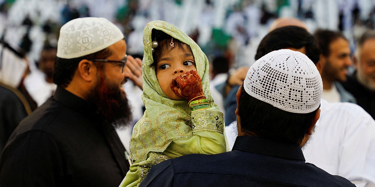 A girl looks on as worshippers attend Eid prayer at Education City Stadium, in Al Rayyan, Qatar, March 30, 2025. — Reuters