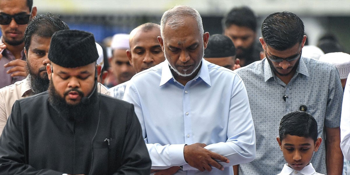 Maldives President Mohamed Muizzu (C) offers prayer on Eid ul Fitr in Male, in Maldives on March 30, 2025. — AFP