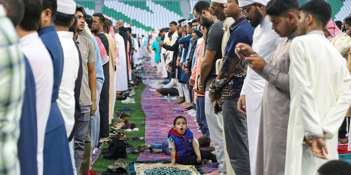 A boy yawns as Muslim worshippers attend Eid ul Fitr prayer marking the end of the holy fasting month of Ramadan, at Education City Stadium, in Al Rayyan, Qatar, March 30, 2025. — Reuters