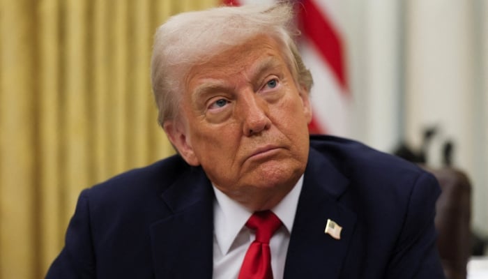 US President Donald Trump prepares to sign an executive order related to the US live entertainment ticketing industry in the Oval Office at the White House in Washington, DC, on March 31, 2025. — Reuters