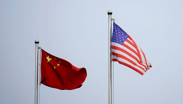 The image shows US and China flags. — Reuters/File