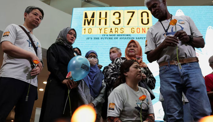 Families of passengers from both China and Malaysia, who were aboard the missing Malaysia Airlines flight MH370, are seen during a remembrance event commemorating the 10th anniversary of its disappearance, in Subang Jaya, Malaysia, March 3, 2024. — Reuters