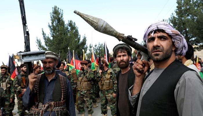 Armed men attend a gathering on the outskirts of Kabul, Afghanistan June 23, 2021. — Reuters