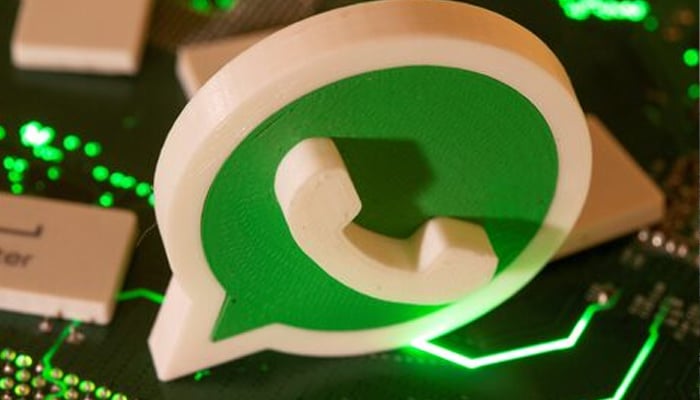 A 3D printed Whatsapp logo and keyboard buttons are placed on a computer motherboard in this illustration taken January 21, 2021. — Reuters