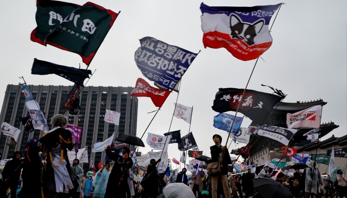 People attend a rally to celebrate the expulsion of South Korean President Yoon Suk Yeol in Seoul, South Korea, on April 5, 2025. — Reuters
