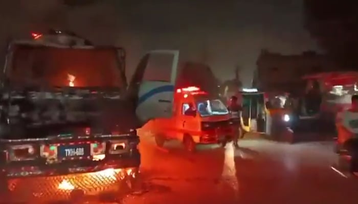 The image shows a dumper on fire in Karachi, on April 9, 2025. — Screengrab via X@Samarjournalist