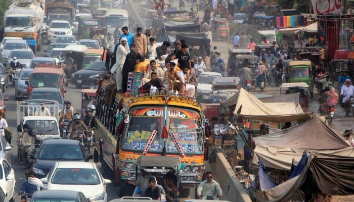 Traffic clogs a road in Lahore. — Reuters/File