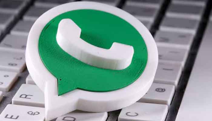 A 3D-printed WhatsApp logo is placed on the keyboard in this illustration taken on April 12, 2020. — Reuters