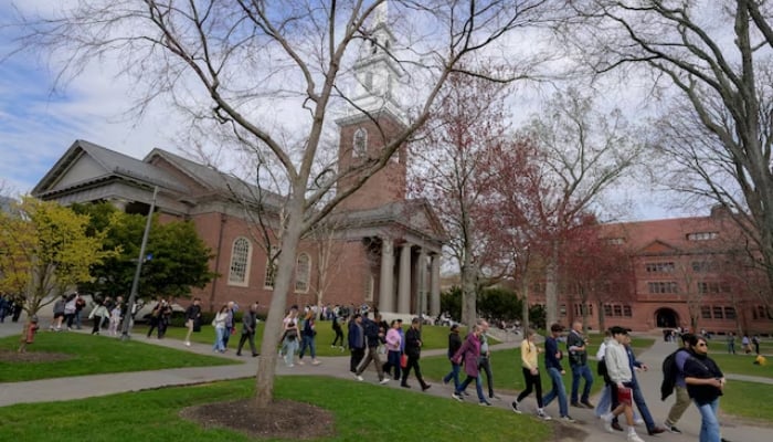 Students walk on the campus of Harvard University in Cambridge, Massachusetts, US, on April 15, 2025. —Reuters