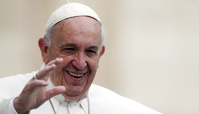 Pope Francis waves as he arrives to lead the weekly audience in Saint Peters Square at the Vatican in this file image. — Reuters