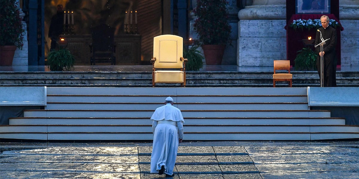Pope Francis walks towards the platform to preside over a moment of prayer on the sagrato of St Peters Basilica, the platform at the top of the steps immediately in front of the facade of the Church, to be concluded with the Pope giving the Urbi et orbi Blessing, at the Vatican on March 27, 2020. — AFP