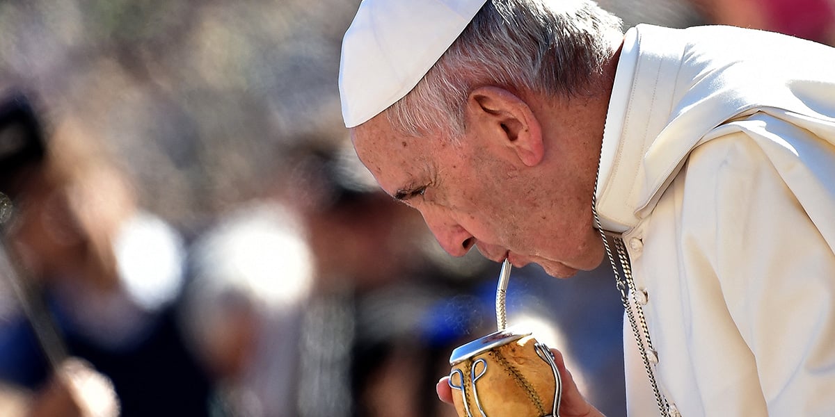 Pope Francis drinks Mate while arriving for his weekly general audience in Saint Peters square in Vatican on October 12, 2016. — AFP