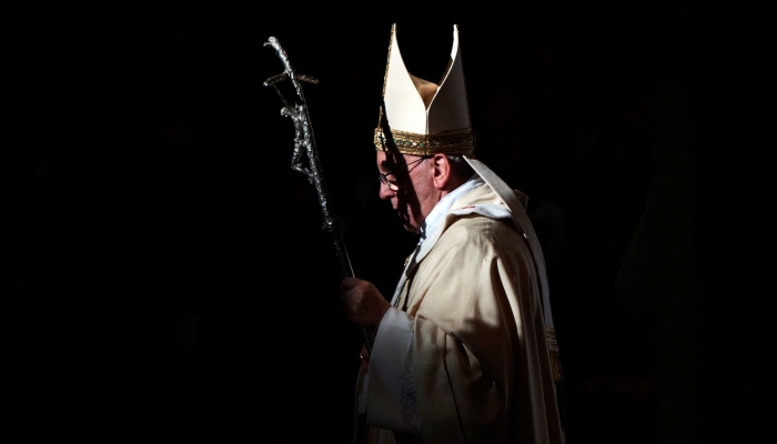 Pope Francis walks with his pastoral staff as he leads the Epiphany mass in Saint Peters Basilica at the Vatican January 6, 2014. — Reuters