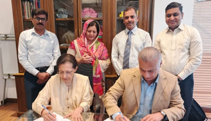 The signing ceremony of the MoU between Khan Academy Pakistan and CARE Foundation.