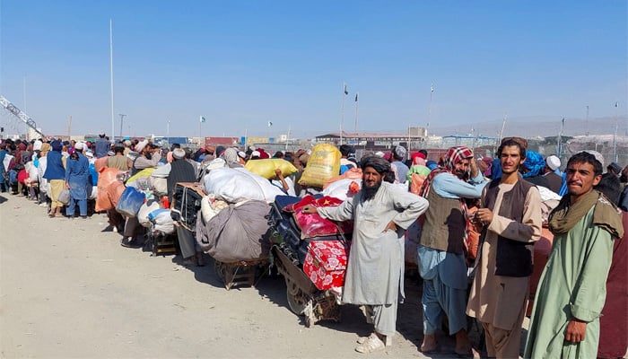 Afghan citizens wait with their belongings to cross into Afghanistan at the Friendship Gate of Chaman Border Crossing along the Pakistan-Afghanistan Border in Chaman, Balochistan, on October 31, 2023. — Reuters
