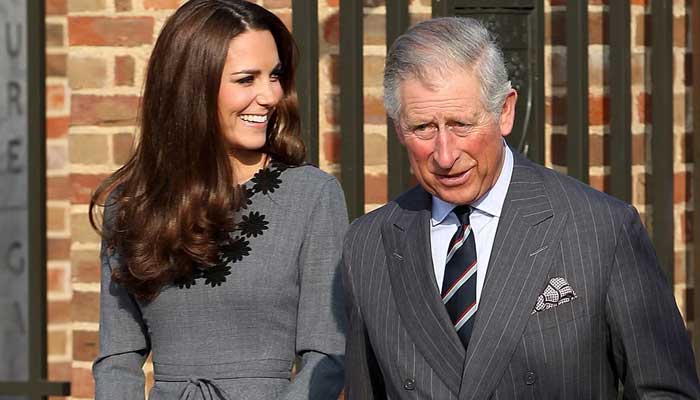 King Charles with Kate Middleton-File photo
