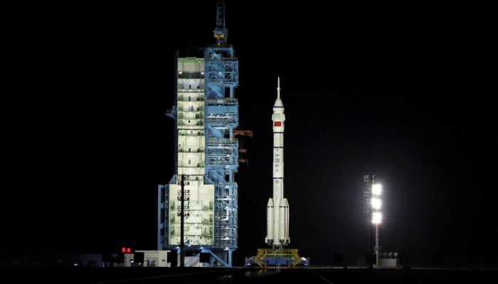 A Long March-2F rocket carrying the Shenzhou-19 spacecraft sits at the launch pad before taking off from the Jiuquan Satellite Launch Center for a crewed mission to Chinas Tiangong space station, near Jiuquan, Gansu province, China October 30, 2024. — Reuters