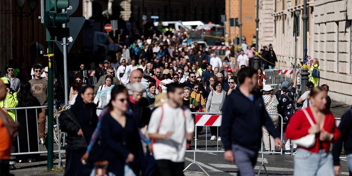 People gather on the day of the funeral for Pope Francis, in Rome, Italy, April 26, 2025. — Reuters